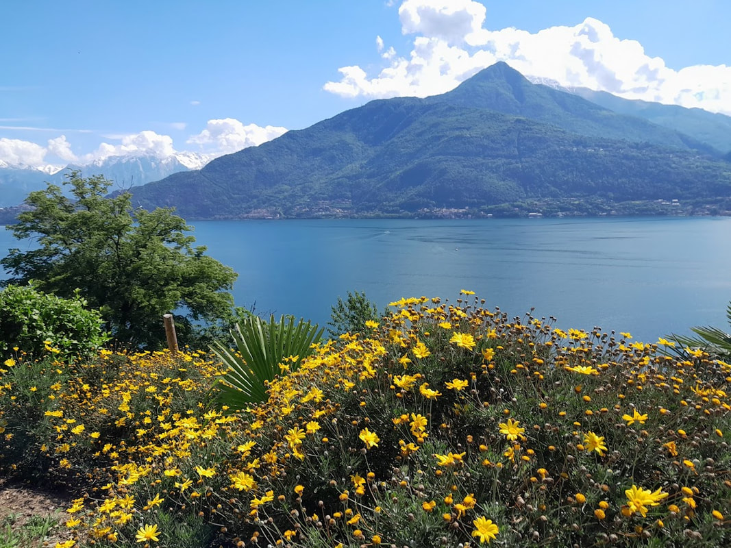 Cyclists on Lake Como in Beautiful Weather Cyclists on Lake Como in Beautiful Weather