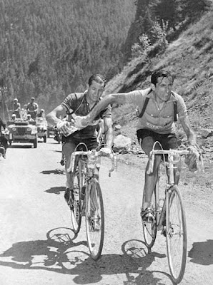 Coppi and Bartali passing the water bottle Coppi and Bartali passing the water bottle
