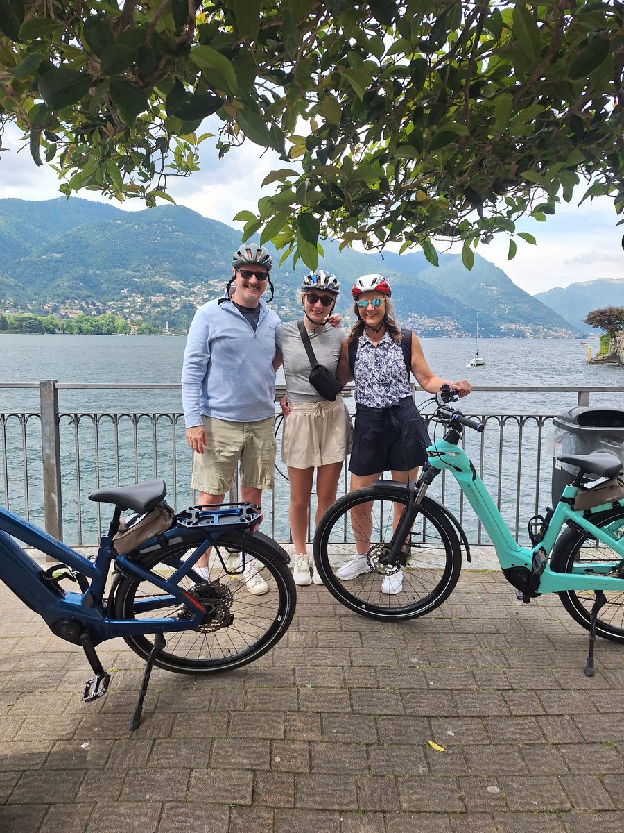 Group of Cyclists by Lake Como