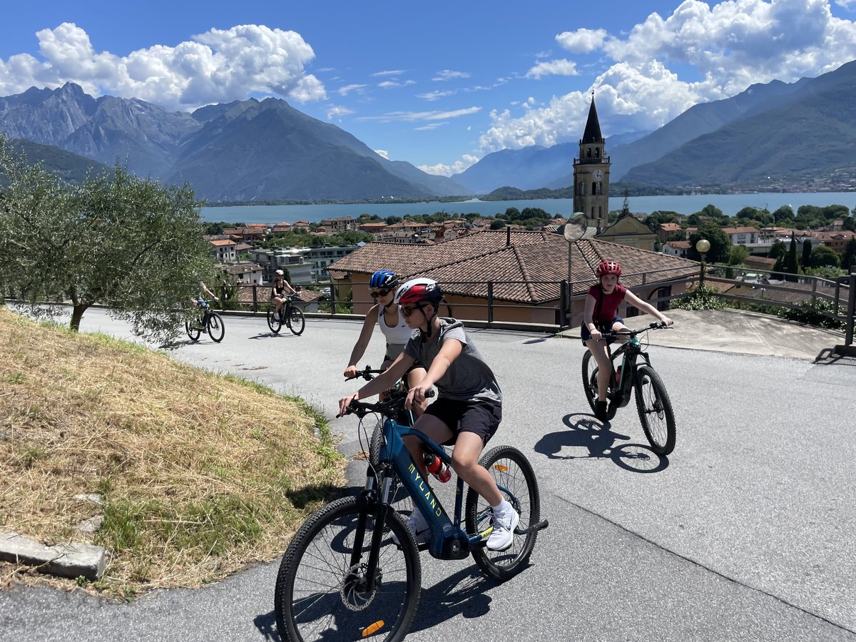 Cyclists Riding Down a Hill