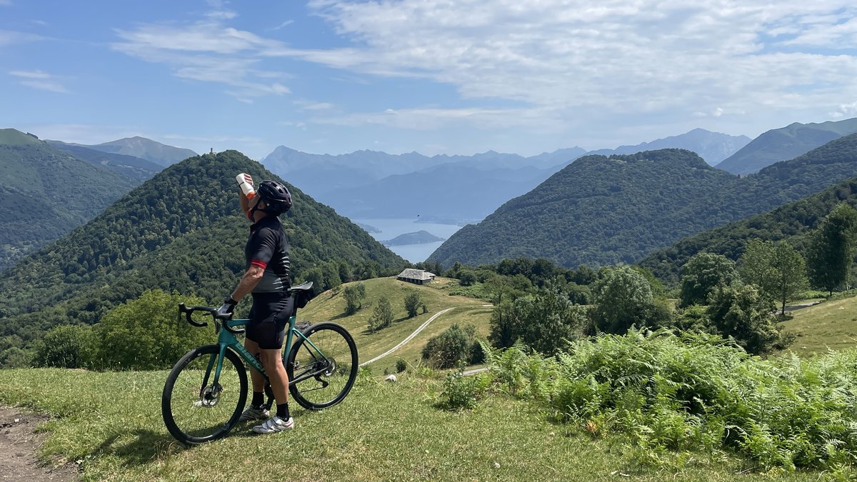 Cyclist with Scenic View of Lake Como
