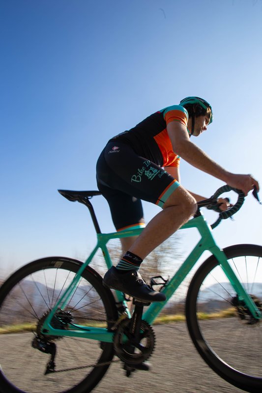 Cyclist on lake como road