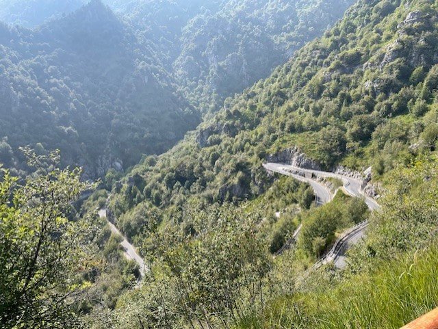 Winding Road through Mountains