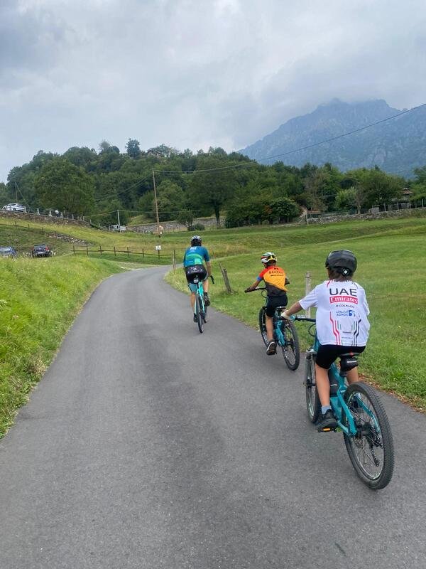 Children Biking on a Scenic Road